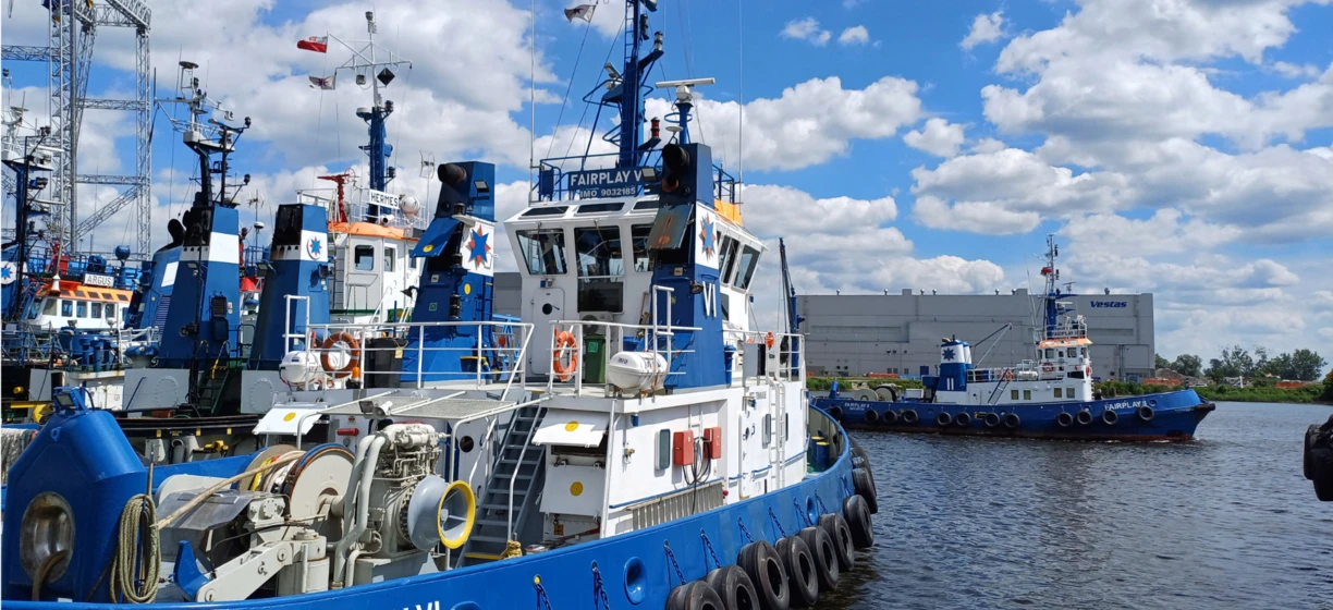 A tugboat transports a ship through a channel on the waterway. Naval architecture and machine HERMES are visible on the vessels. #Boat #Watercraft #NavalArchitecture #Transport #Sea