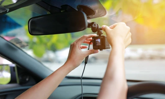 A high-tech rear-view mirror with integrated camera and display, bringing advanced technology to your vehicle for improved communication and safety.