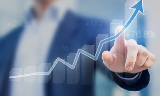 A diagram showing a businessperson analyzing data with a growth rate of 76.8%. Management decisions are being made based on the -1.55 change in figures.