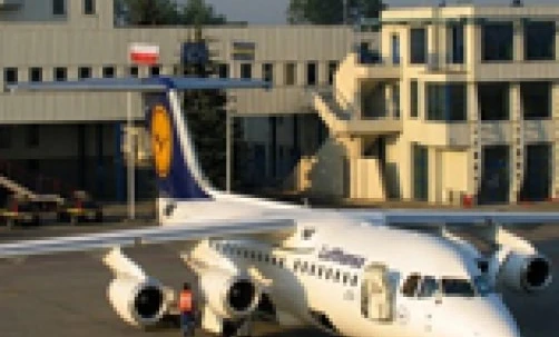 A fixed-wing aircraft parked on an airport apron, symbolizing air travel and the aerospace engineering industry. Airliner ready for transport, highlighting the aviation and airline sector.