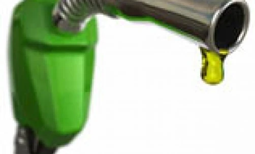 A fuel dispenser at a filling station with a hose and nozzle for gasoline. Gasoline machine for refueling vehicles.