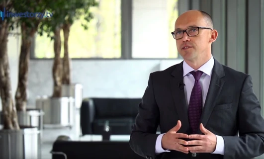 A white-collar worker standing confidently in formal wear and glasses, symbolizing professionalism and vision care. #InvestorzyTy #FashionGoals