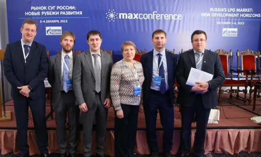 A group of businesspeople in formal wear collaborating at the Russia's LPG Market conference in December 2015. Featuring suits, blazers, ties, and dress shirts, representing the new development horizons in the industry. #maxconference #lpgmarket #businessdevelopment