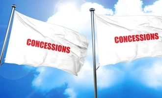 Alt-text: A variety of concession stands with signs advertising various food and drinks. Get your CONCESSIONS here!