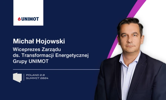 Michał Hojowski, Wiceprezes UNIMOT, w formalnym stroju biznesowym reprezentujący firmę na POLAND 2.0 SUMMIT 2024.